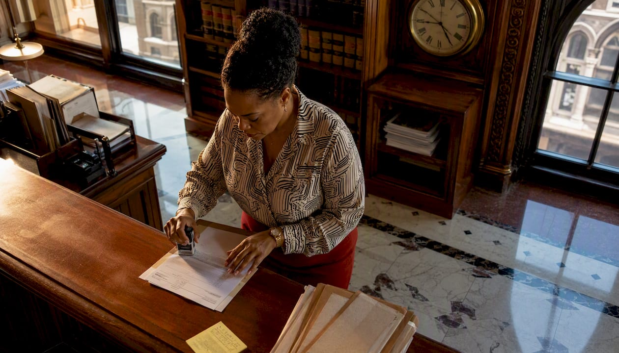 Court clerk processing cash bail refund forms